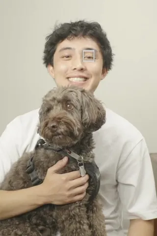 me, smiling and holding my dog